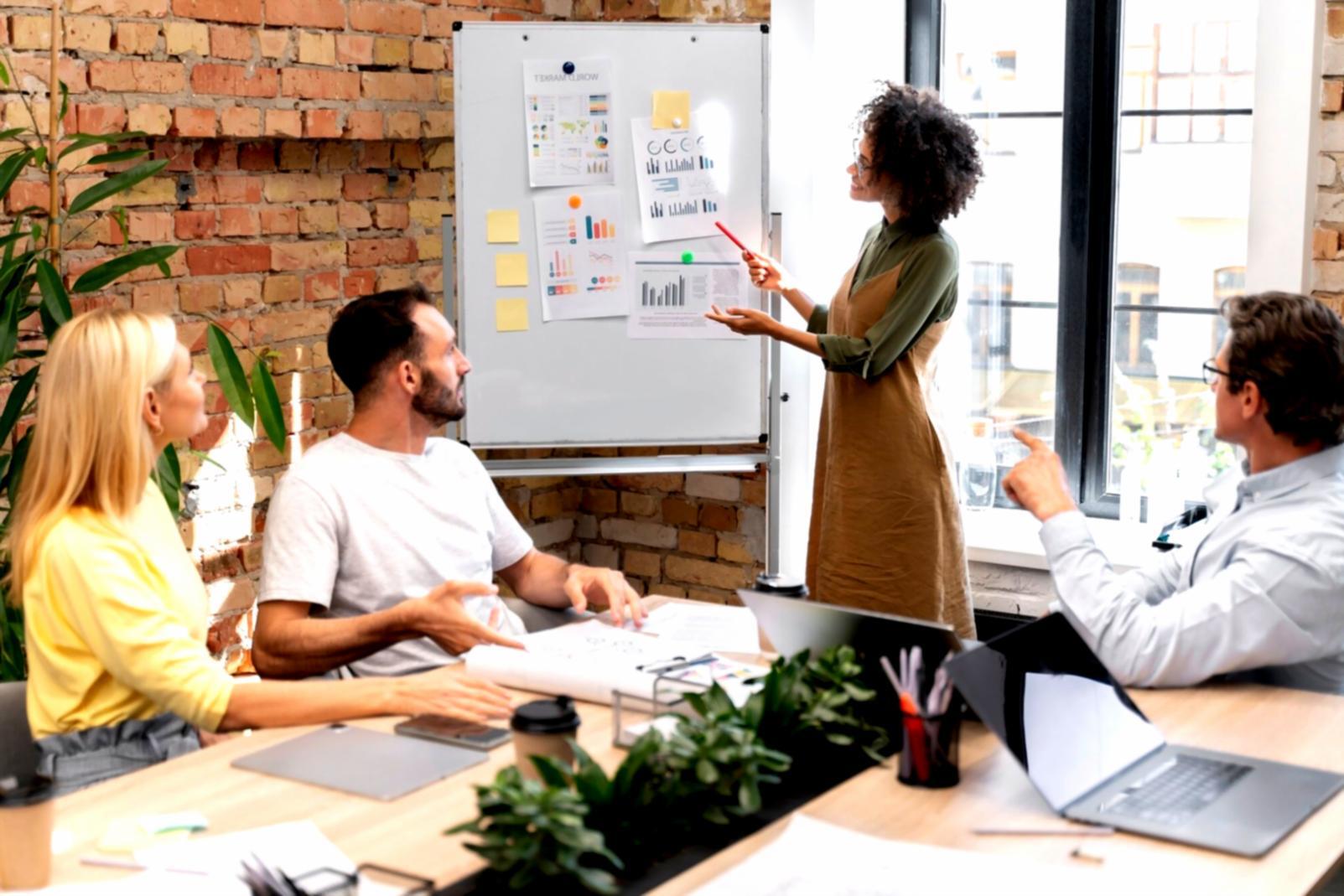 Person reviewing financial documents and celebrating budget success